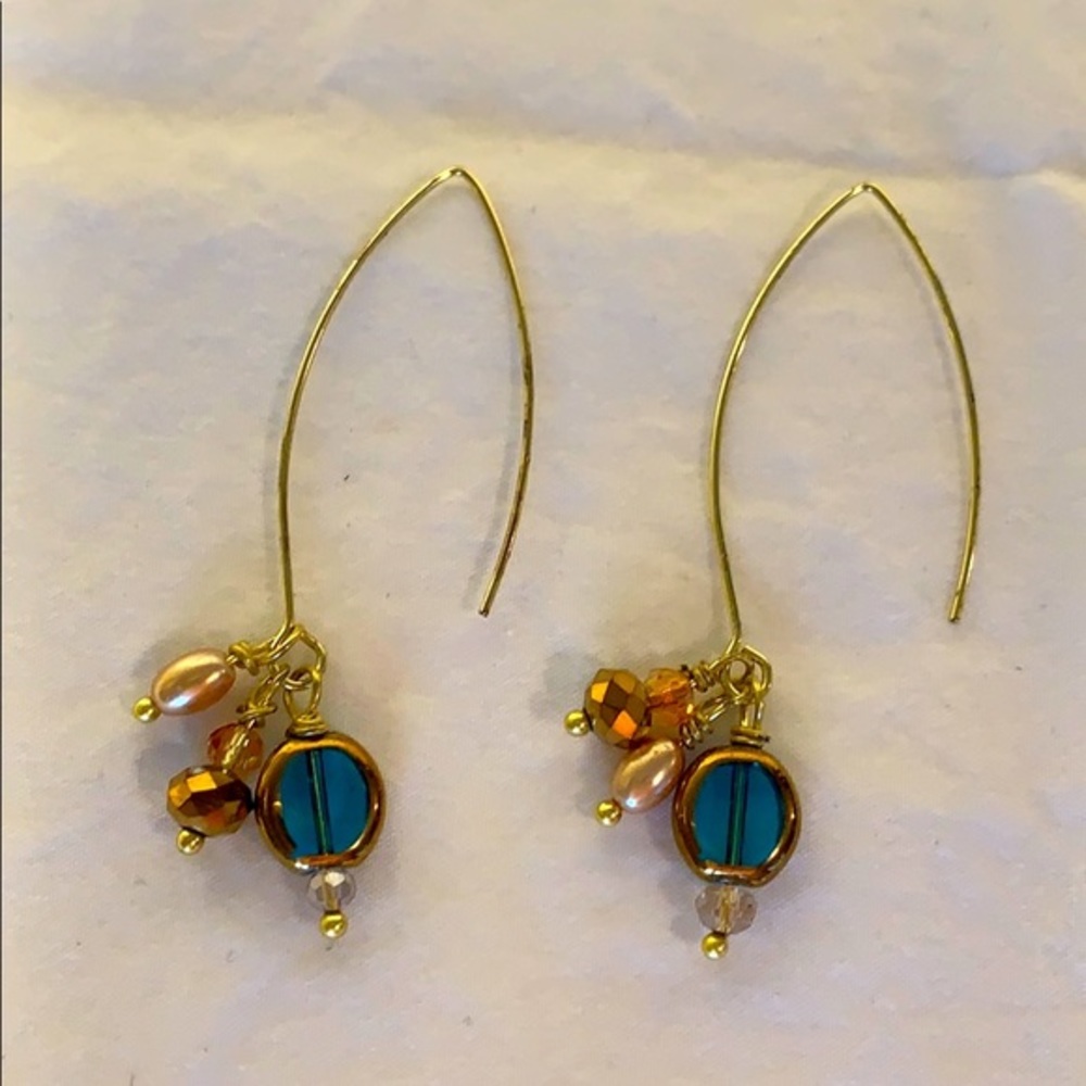 Gold with multi color beads dangle wire ea…